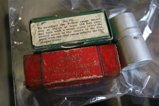 A Leitz rangefinder, another rangefinder and a film spool